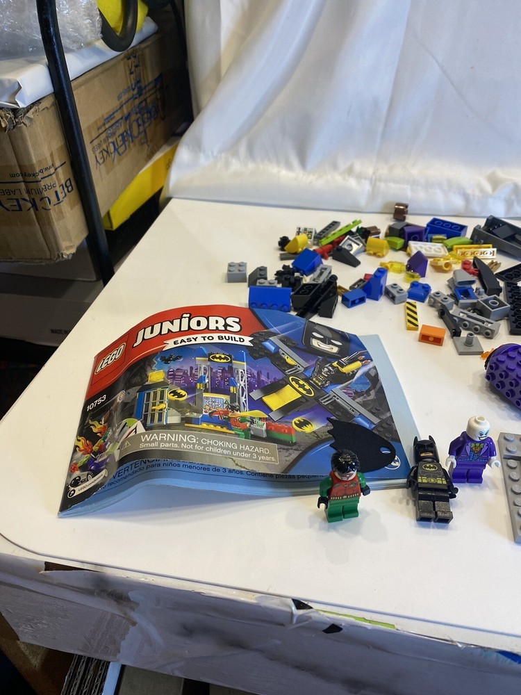lego blocks and 3 figures with booklet