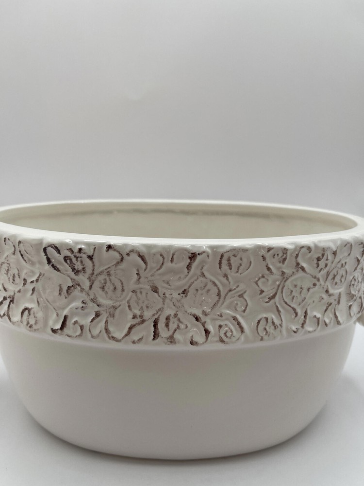 Ivory pottery planter with distressed rim
