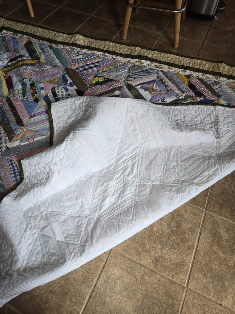 QUILT. 78X96. MACHINE QUILTED. 100 DIFFERENT PATTERNS