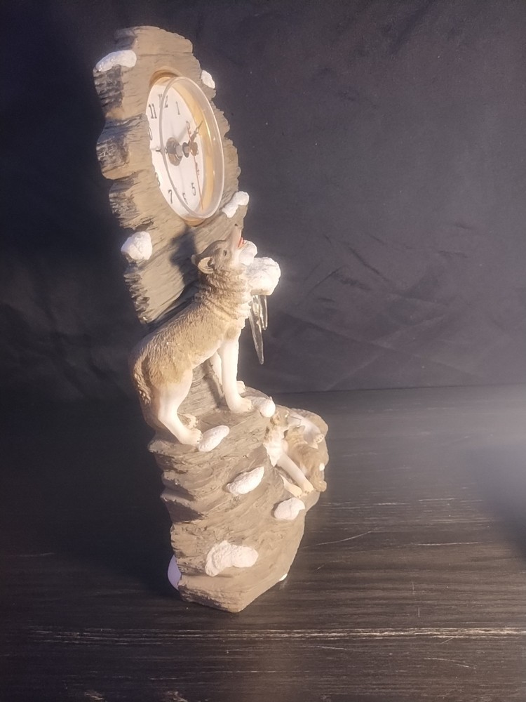 wolf clock missing ear and ice