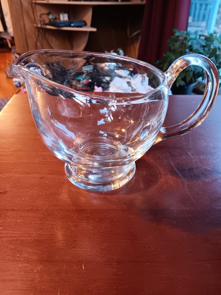 HAND BLOWN GLASS PITCHER. 1309