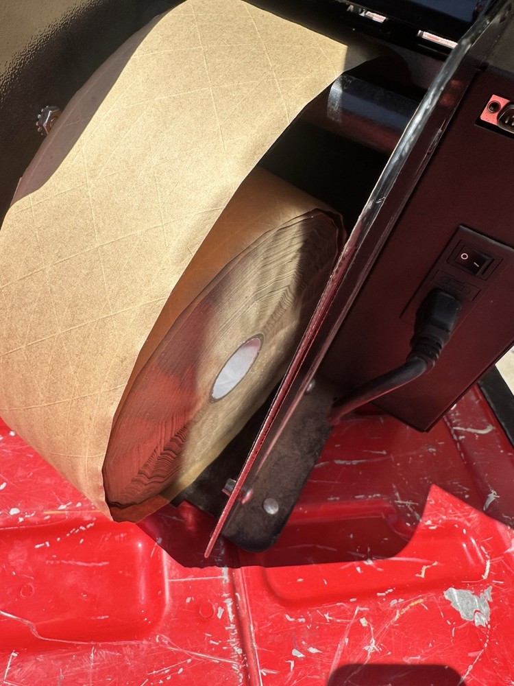 PHOENIX E-4 ELECTRONIC AUTOMATIC GUMMED PAPER PACKAGING TAPE DISPENSER.