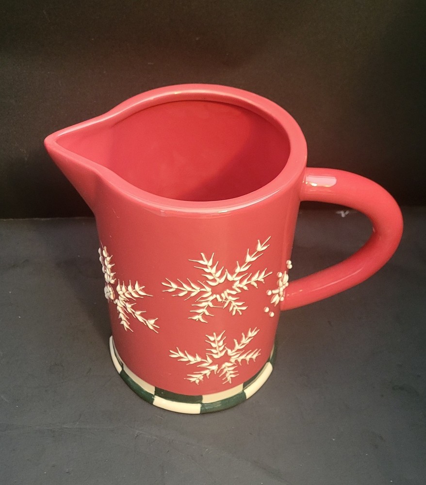 Red Ceramic Pitcher with Snowflake and Green and White checked base.