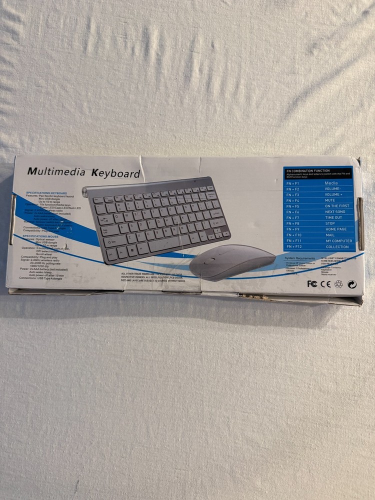 Multimedia Wireless Keyboard/Mouse New in Orginal Box
