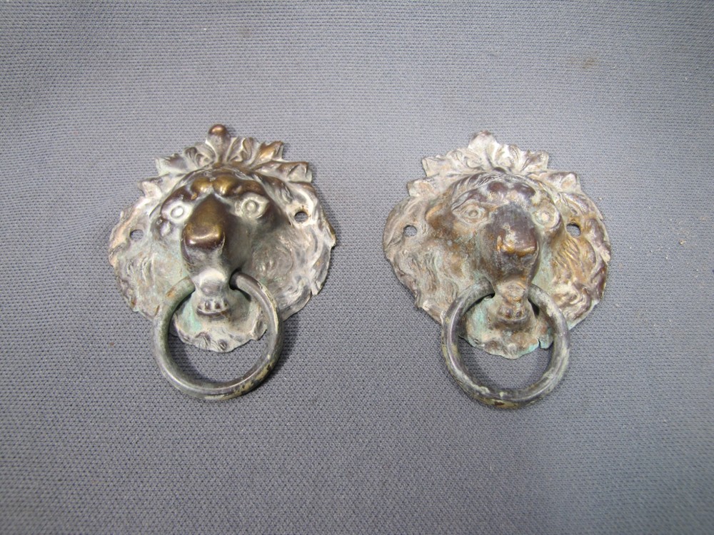 2 antique stamped brass lionhead drawer pulls with Ring