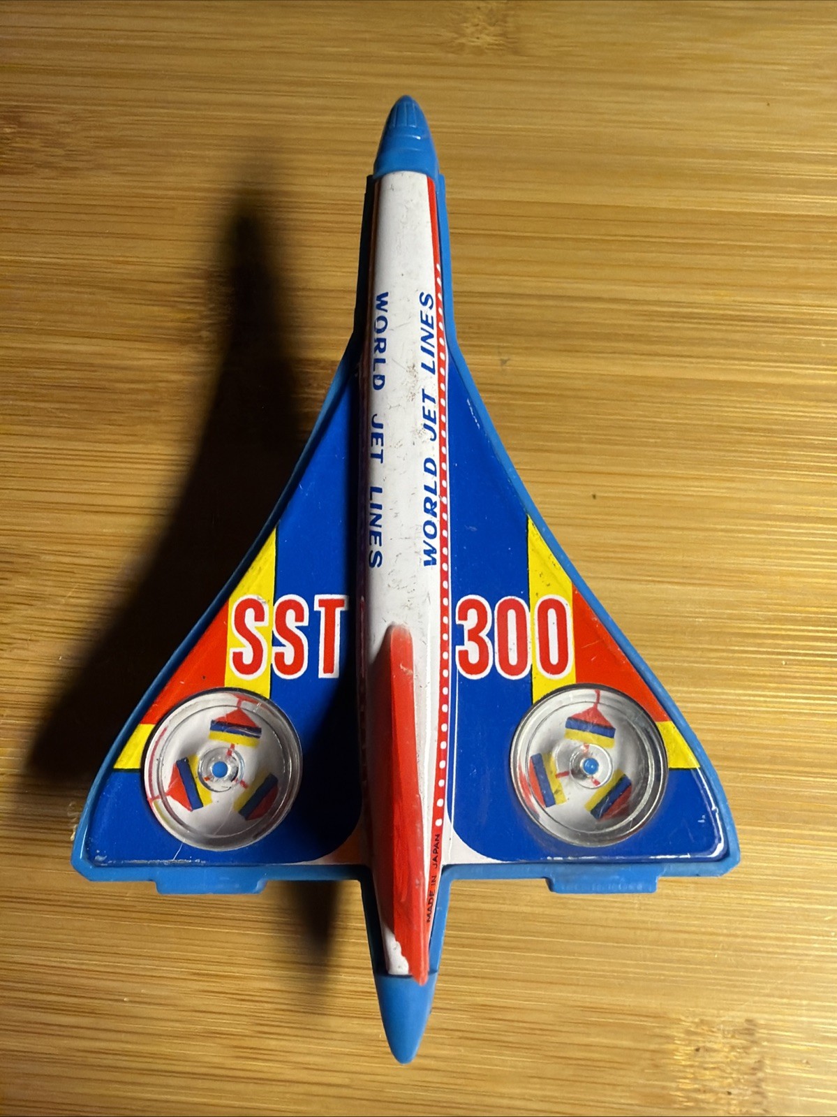 VINTAGE SPARKING SST 5" JET PLANE FRICTION POWERED METAL TOY JAPAN