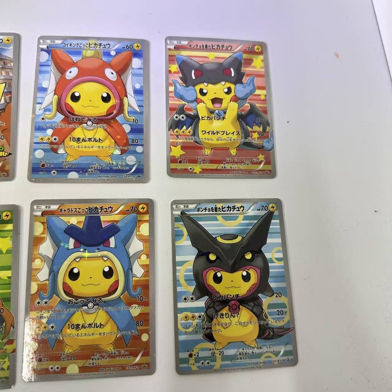 POKEMON PIKACHU PONCHO CHARIZARD MARIO LUIGI RAYQUAZA COMPLETE SET 8 Card