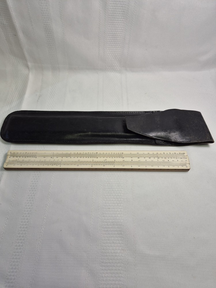 Vintage Slide Rule In Leather Case .