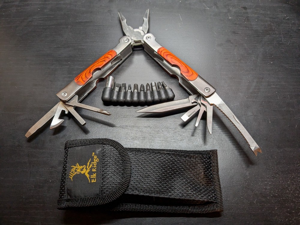 Elk Ridge-Multi Tool With Assorted Tools -pliers -knife-sockets- Bottle Opener