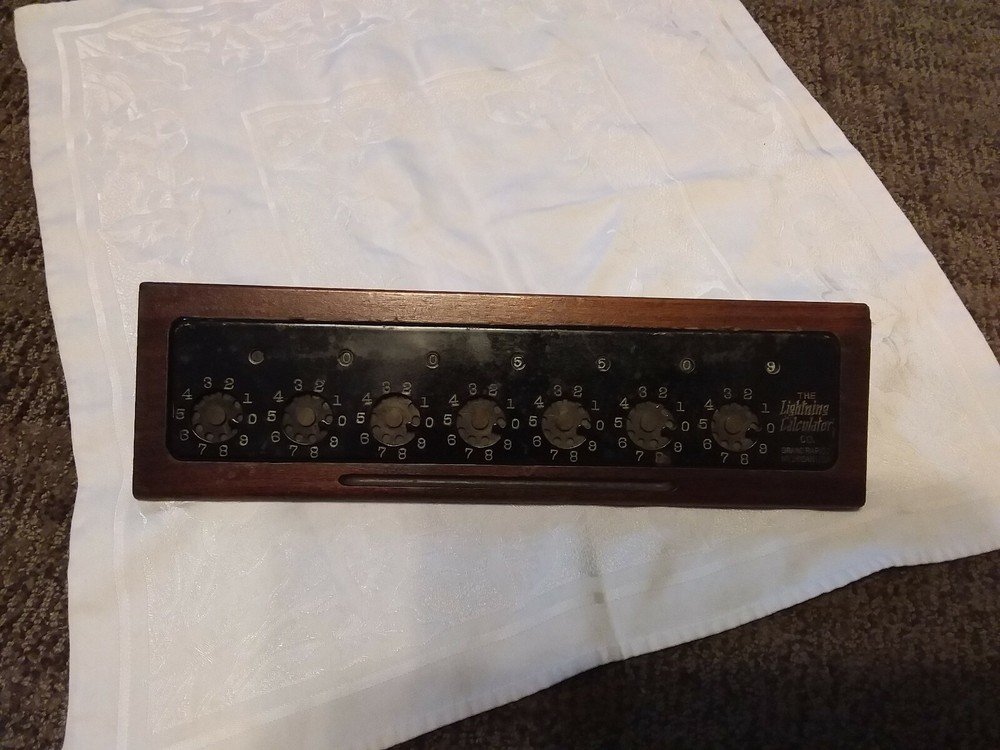ANTIQUE c.1908 "LIGHTNING CALCULATOR COMPANY" ADDING MACHINE, WOOD BASE,13" L