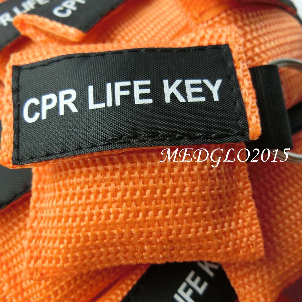 100pcs CPR Mask First Aid Training Mask Transparent Mask Mini Keychain Orange