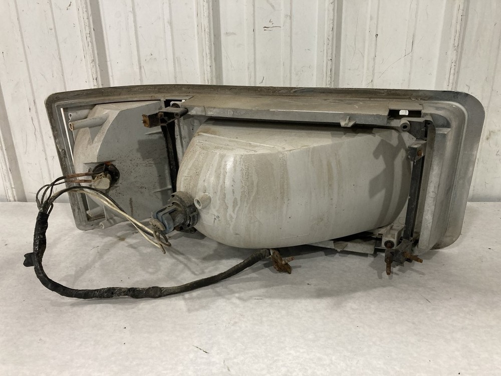 1990-2006 Mack CH600 Left/Driver Headlamp - Used