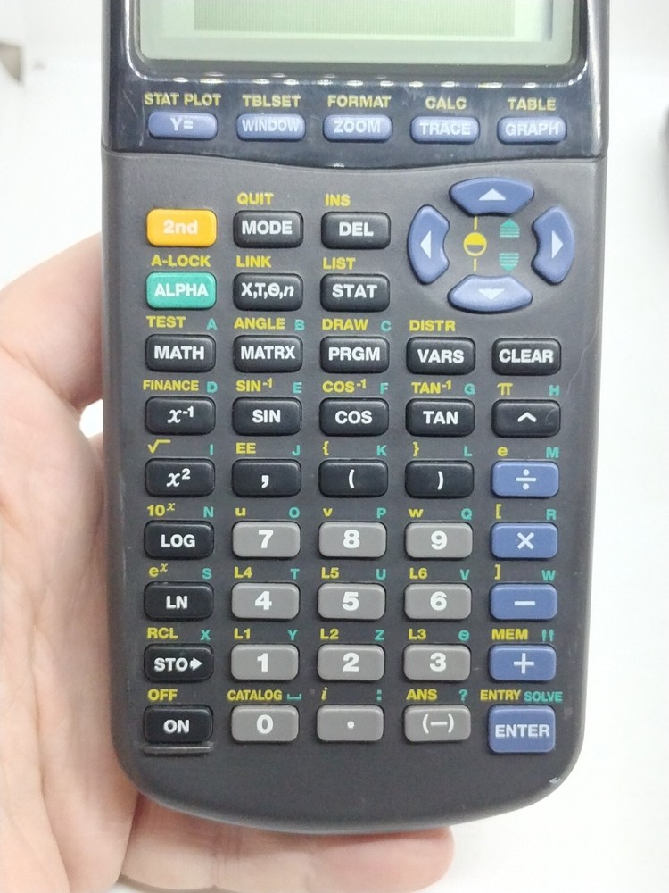 Texas Instruments TI-83 Handheld Graphing Calculator