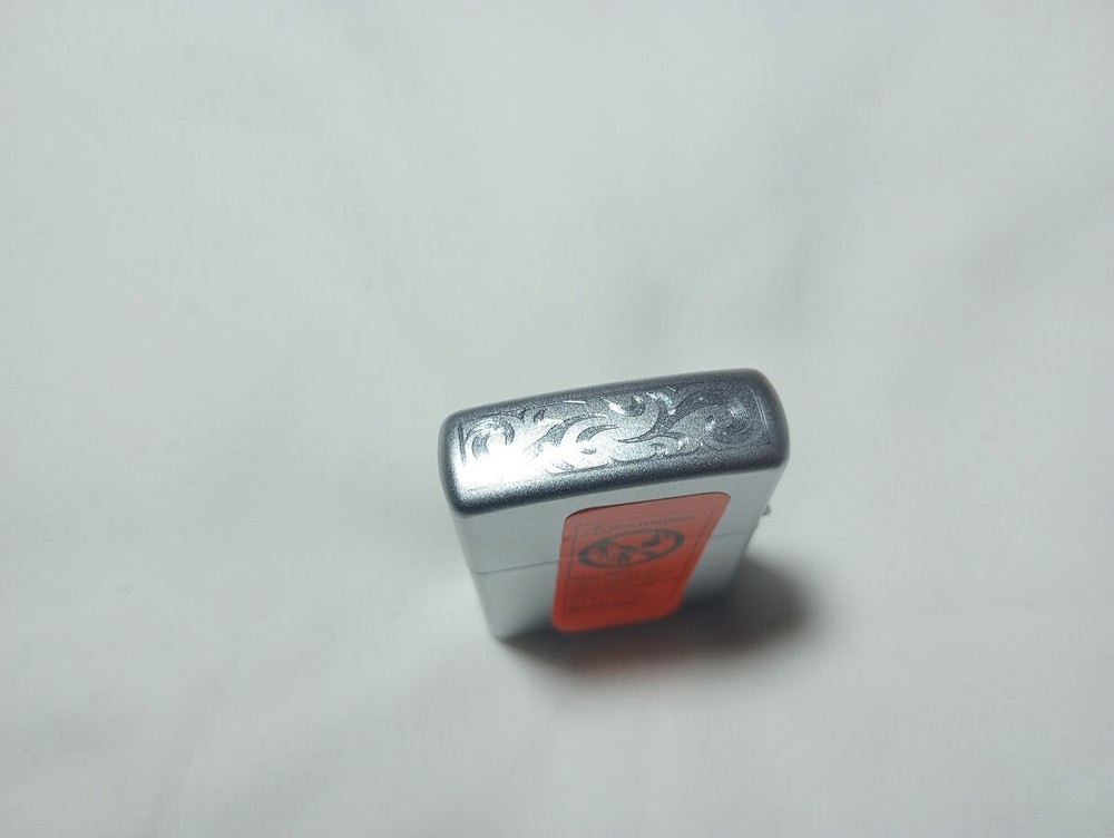 ---New unfired 2005 Zippo DWM monogram engraved lighter