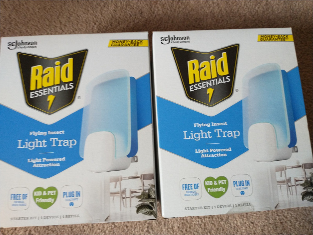 (2) Raid Flying Insects Light Trap Starter Kits (Each kit: 1 Device & 1 Refill)