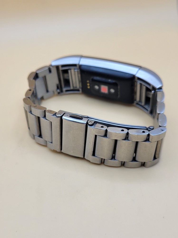 3 Pre-Owned Fitbit Watches & Charger - 2 Tested & Working (Cracks) & 1 Untested