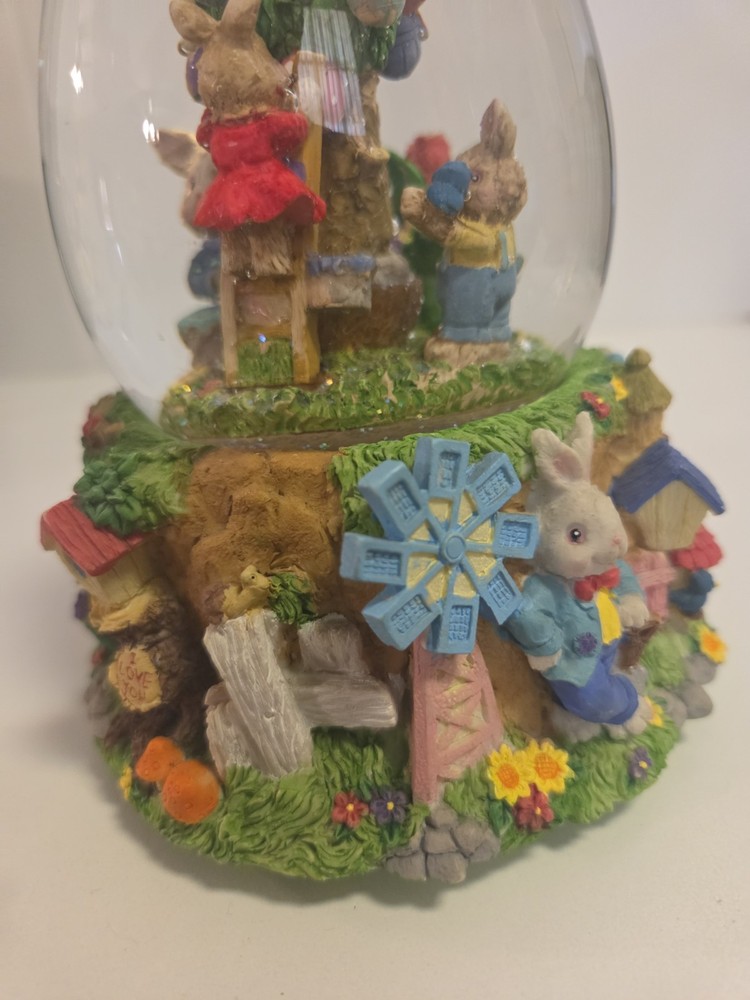 Springtime/Easter musical egg shaped glitter globe plays "Easter Parade"