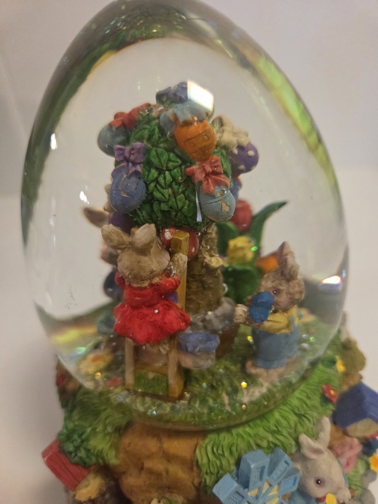 Springtime/Easter musical egg shaped glitter globe plays "Easter Parade"