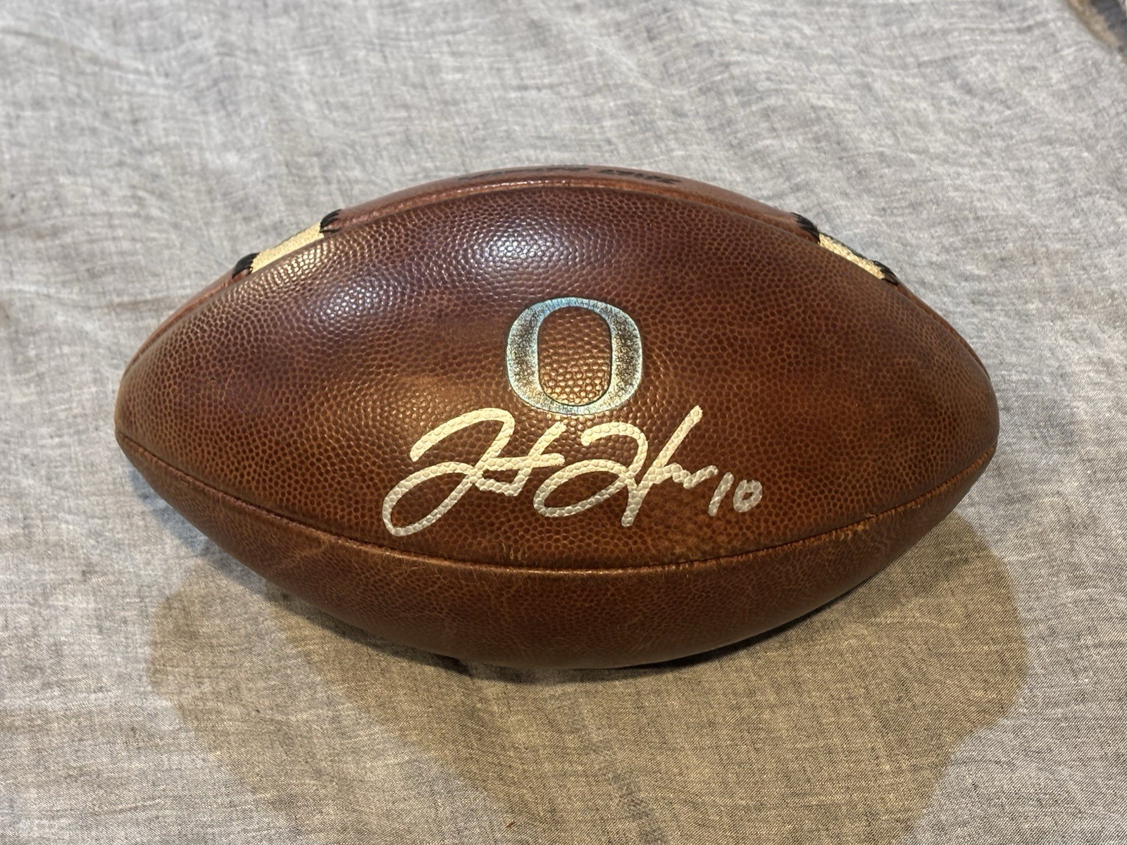 Justin Herbert Game Used Oregon Ducks Signed Football Game Ball Beckett Cert