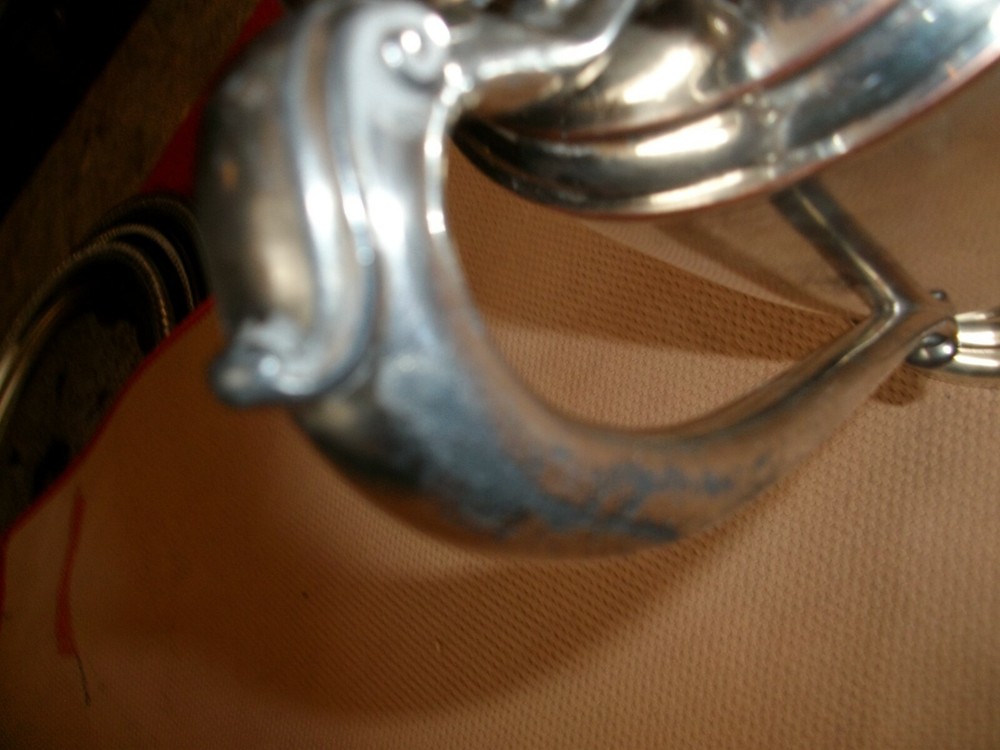 Silver water pitcher with round bottom