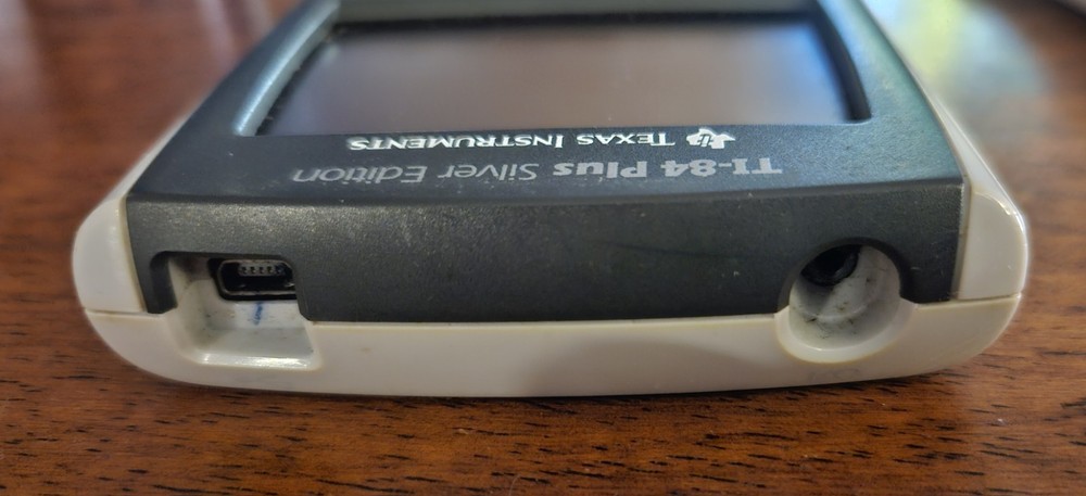 Texas Instruments TI-84 Silver Edition With Cover