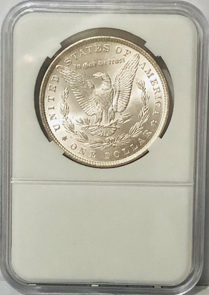 **1887 MORGAN SILVER DOLLAR.**