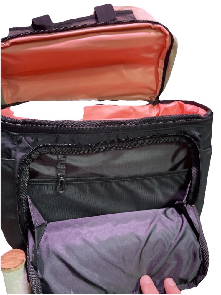 This is a Coleman soft-sided backpack cooler.