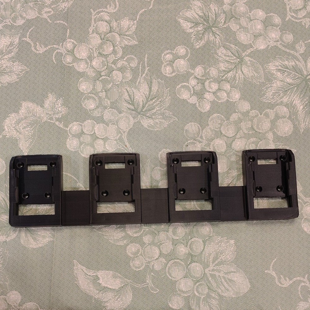 Black Dewalt battery holder, Wall Mountable