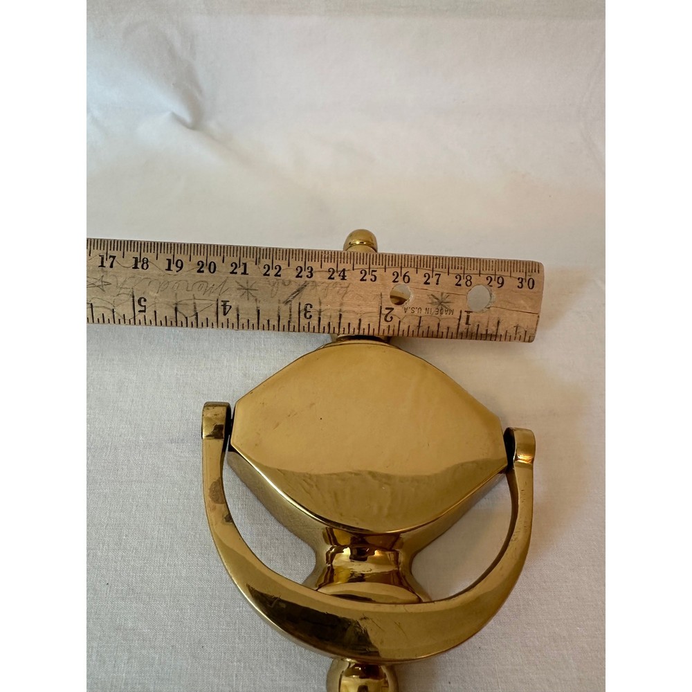 Shiny brass door knocker