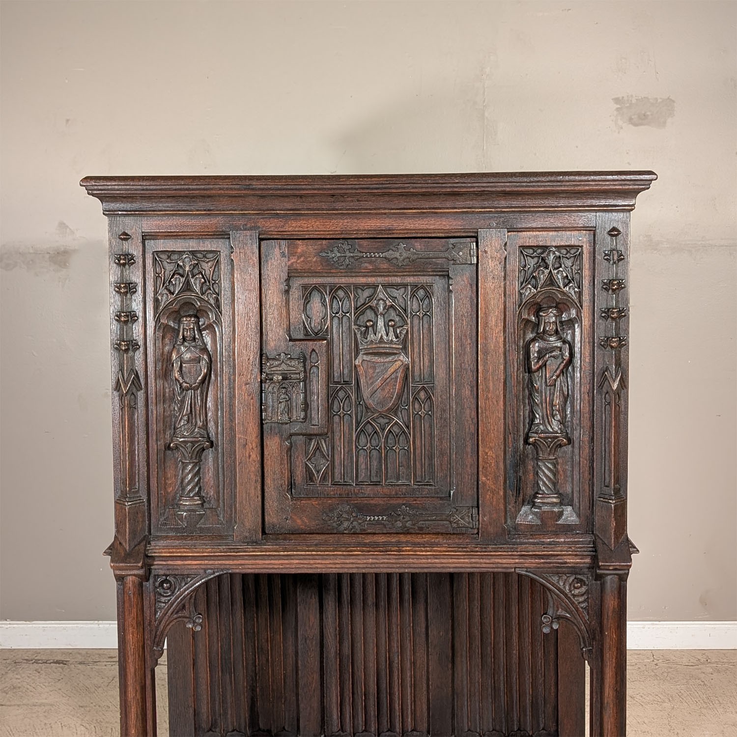 Antique French Gothic Carved Oak Cabinet Stand with Figural Panels Heraldic Door