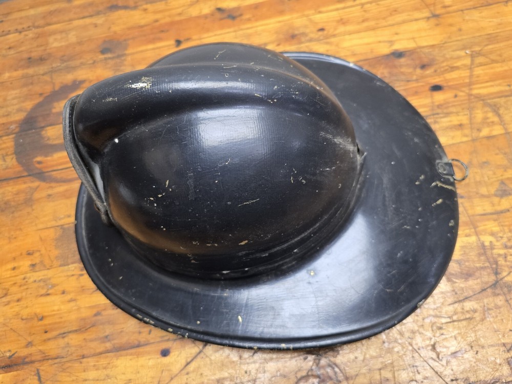 Vintage HHVFD Firemans Helmet Cairns?