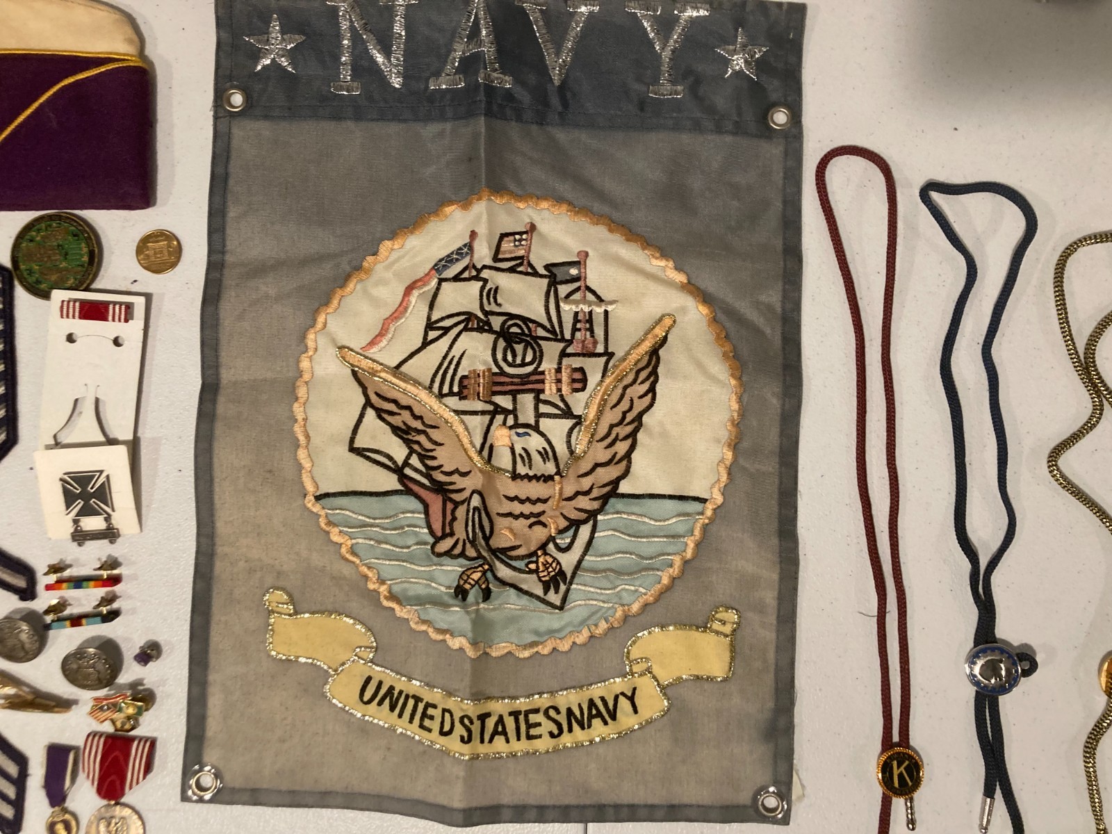 GROUP OF MILITARY PATCHES, PINS AND MEDALS. WWII