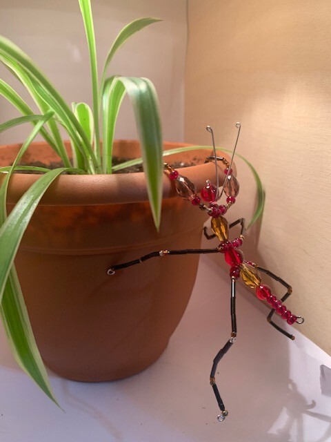Handmade bead and wire praying mantis
