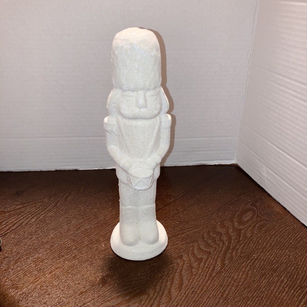 Christmas Ceramic Decor White glitter 10inx2 3/4in nutcracker soldier