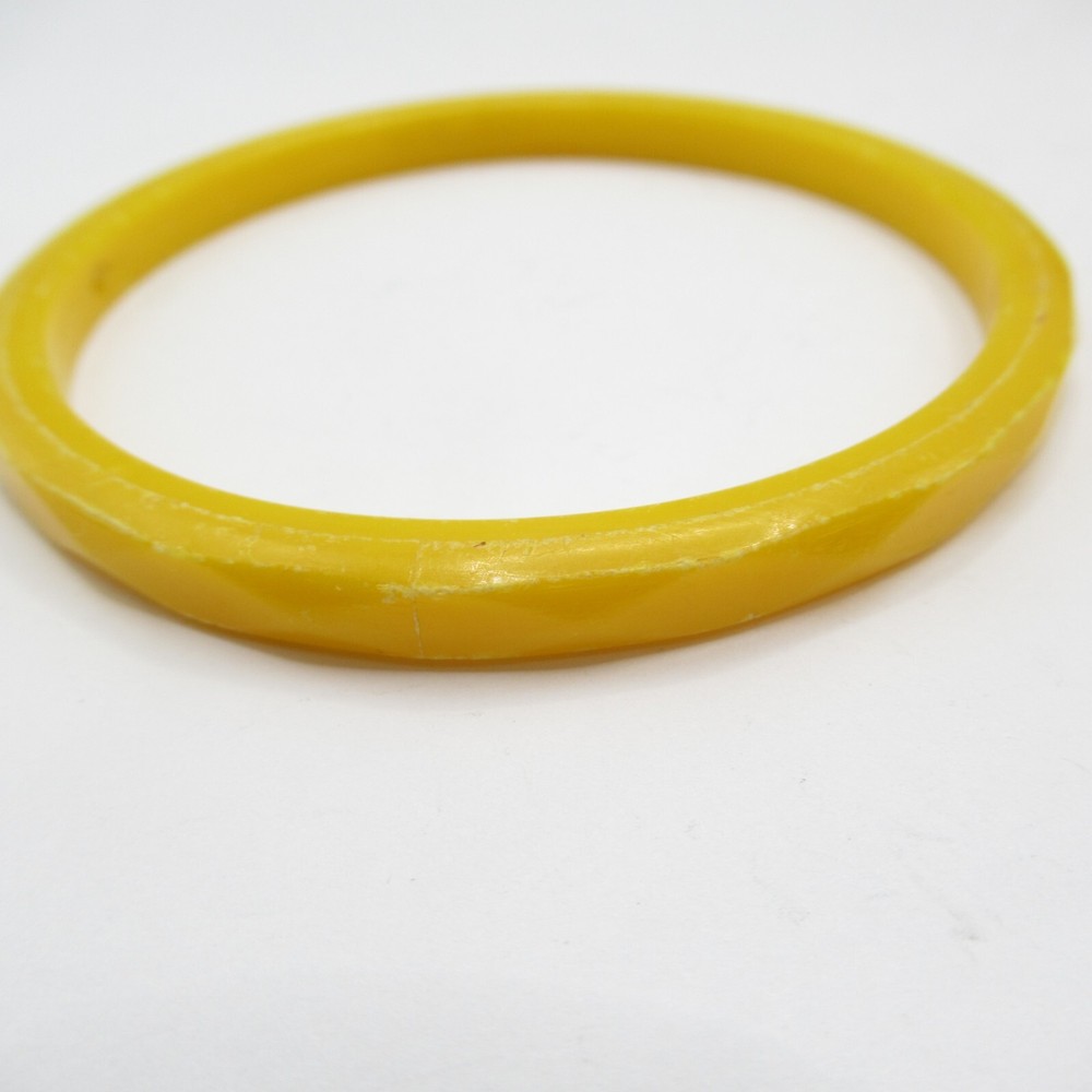 Gold Tone Thin Plastic Bangle Bracelet Multifaceted 'Diamond' Shape Exterior