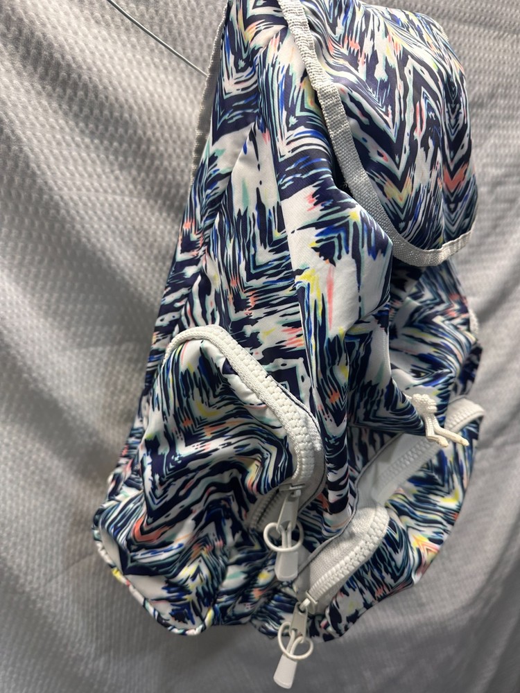 Festive Vibrant Abstract Print Backpack - Drawstring & Flap Closure Medium