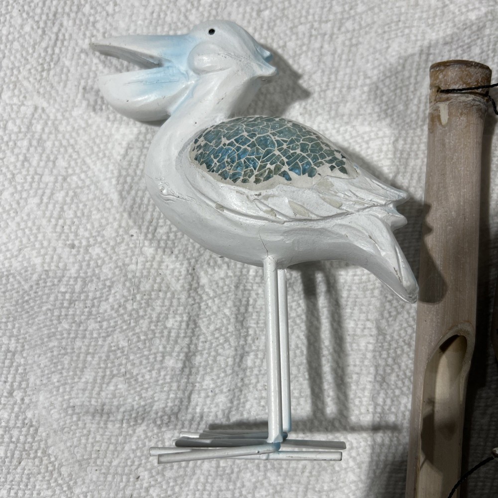 Pelican Wind Chimes & Statues