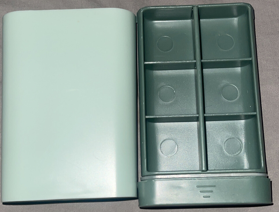 Essentials Pill Box - sliding hard plastic - light green