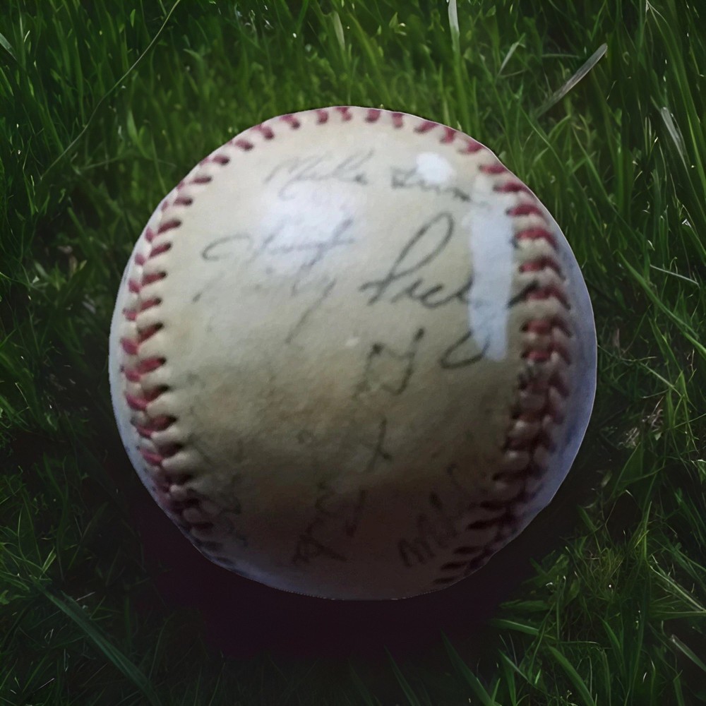 Signed Baseball /Henry Aaron + many players