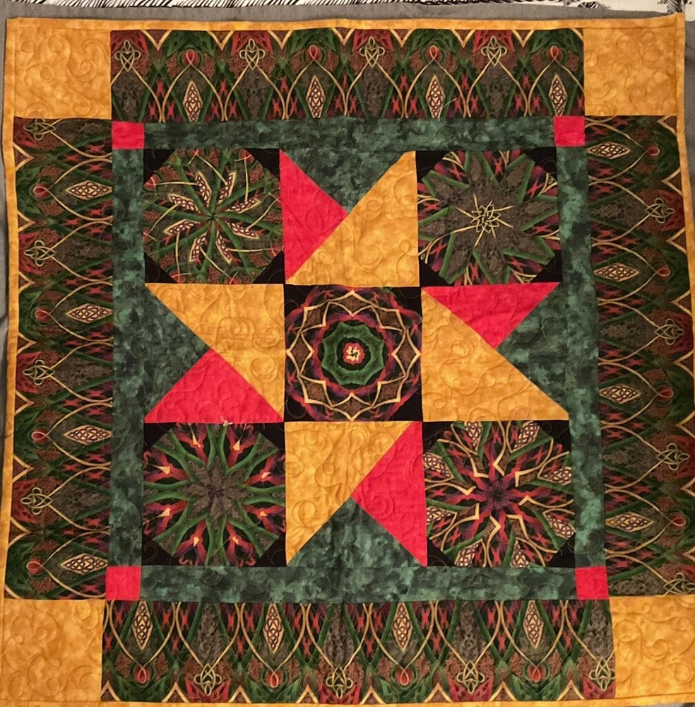 Pieced wall quilt machine embroidered