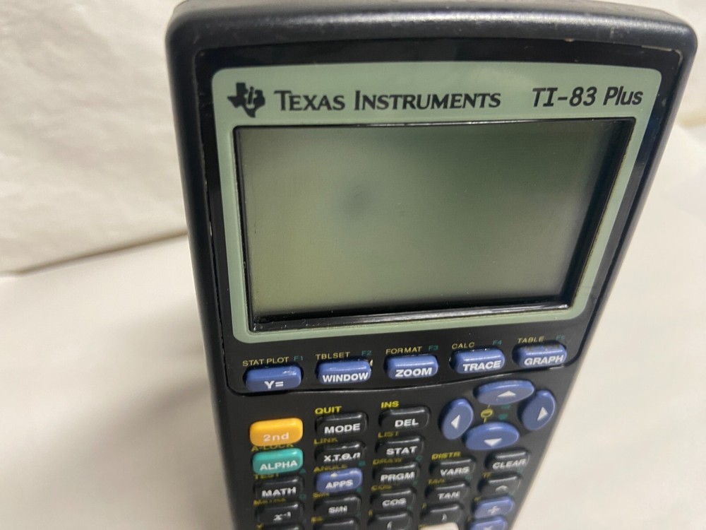 Texas Instruments TI-83 Plus Graphing Calculator Tested Working small dark spot