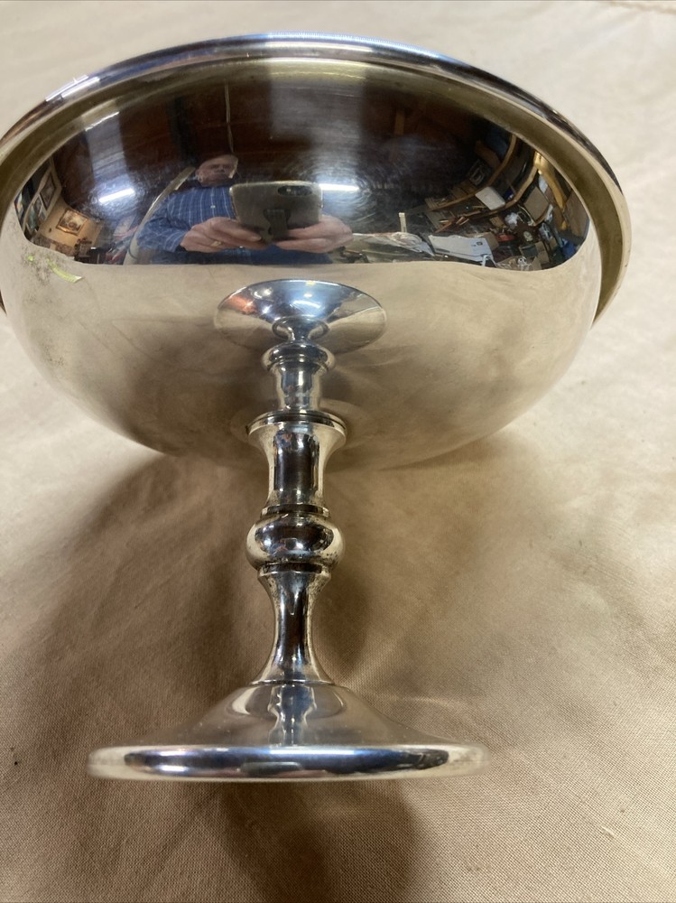 Silver plated candy dish 4 inches high and 5 1/4 inches wide