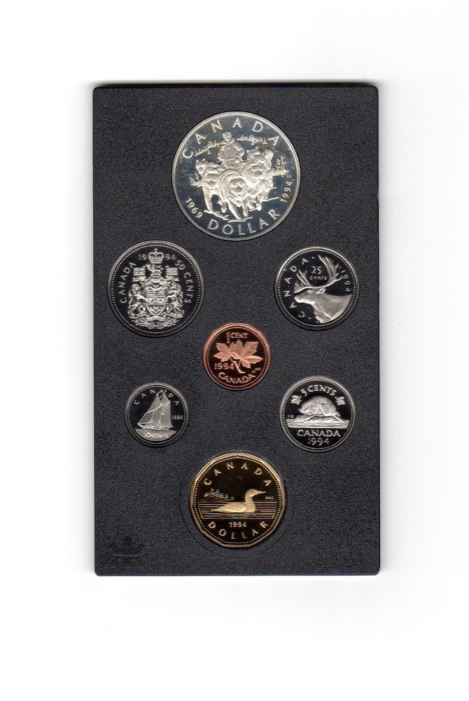 1994 Prestige Proof Set in leather binder, silver dollar and original packaging