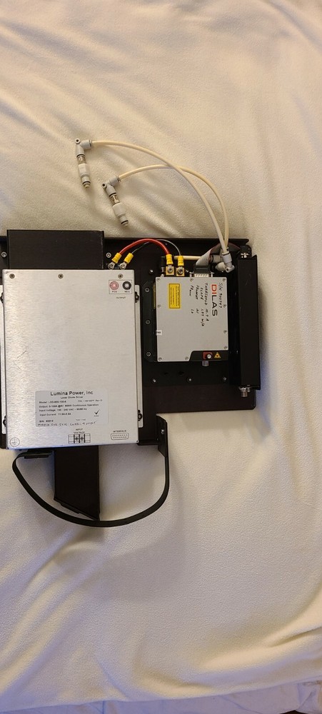 Coherent Laser Dilas with cooling block, interface unit and power supply.