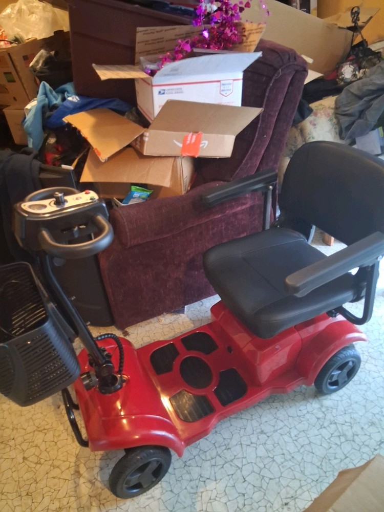 Red Mobility Scooter.