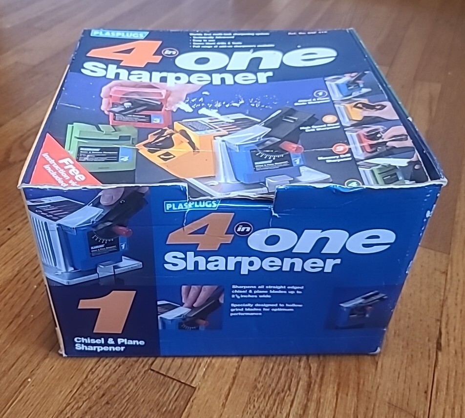 New Open Box PlasPlugs 4 in One Sharpener Knife, Scissor, Drill Bit, Chisel