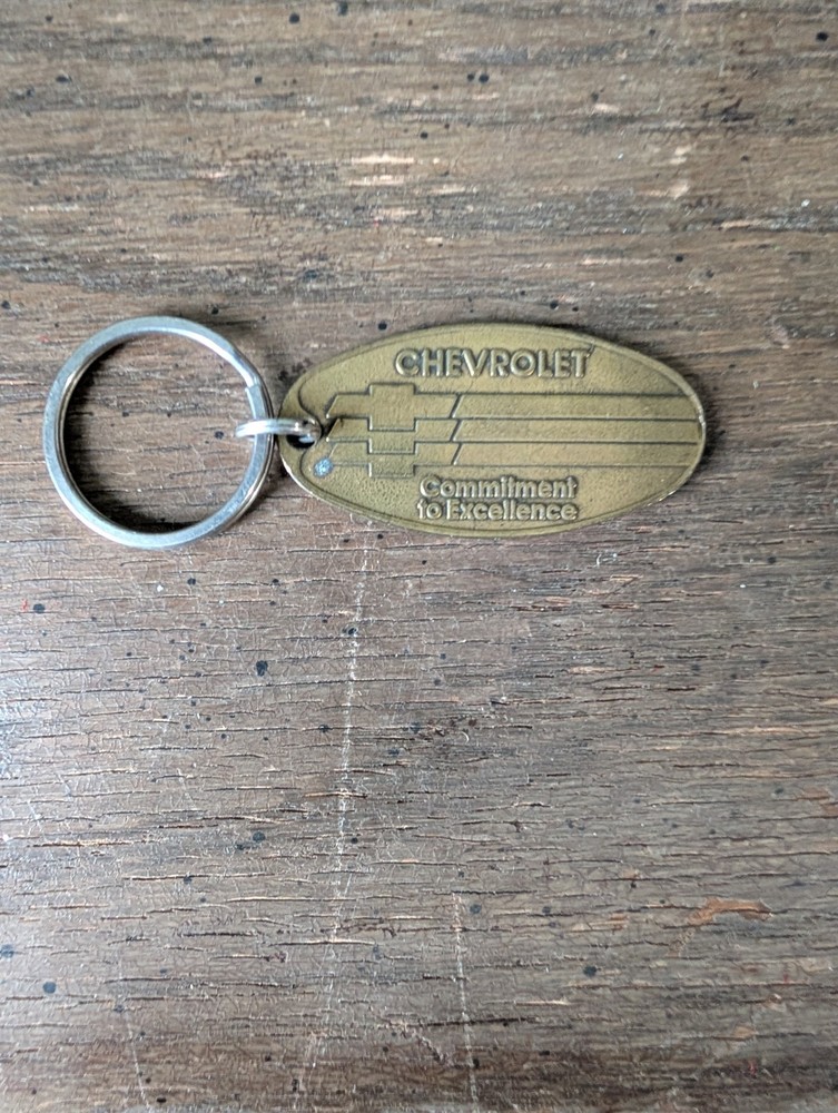 Vtg Chevrolet Commitment To Excellence Brass Return Postage Key Chain Ring Tag
