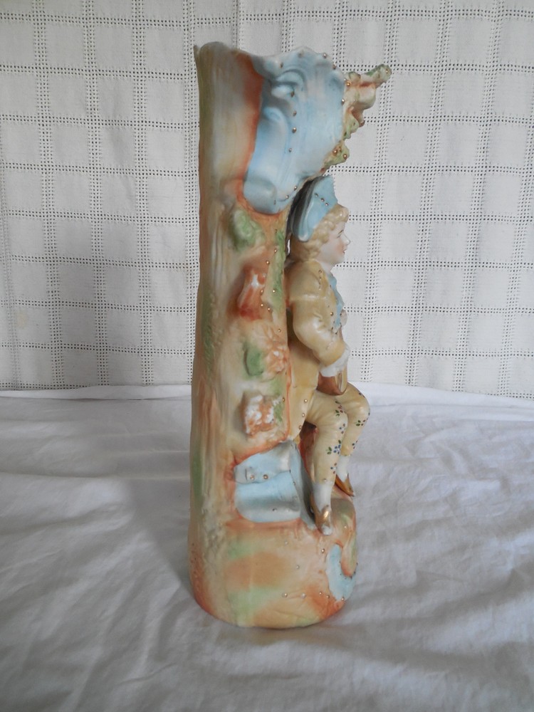 Vintage bisque man w/viola vase Germany?
