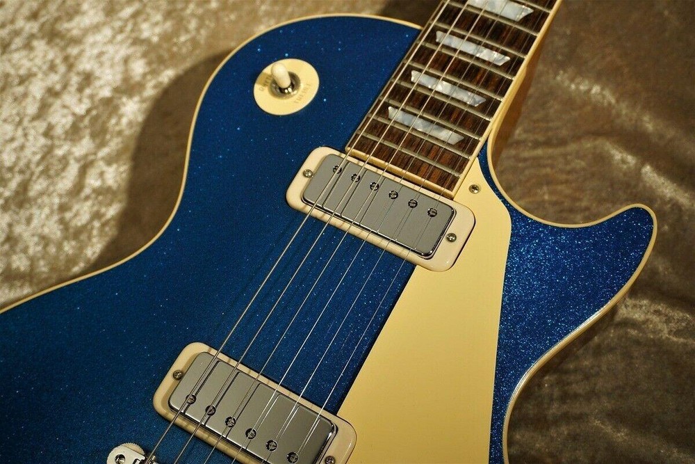 Factory Customized Blue Sparkle Standard Electric Guitar with A Top Quality