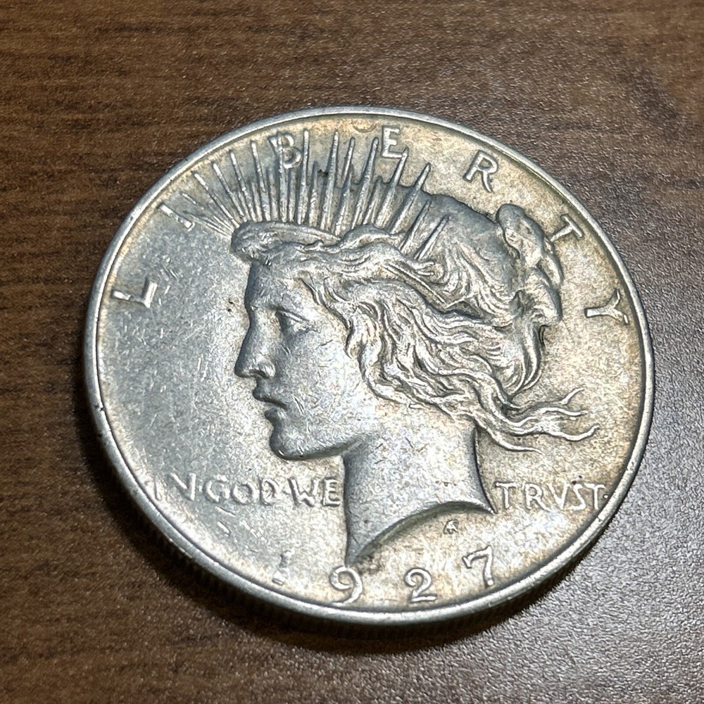 1927-D $1 Peace Silver Dollar AU+